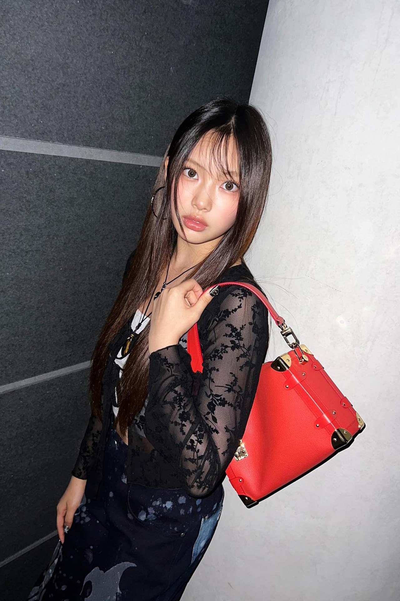 <p><em>Image credit: Instagram.com/newjeans_official.&nbsp;</em></p><p>Hyein wears Minga, Sangkuanz and Louis Vuitton on October 14, 2023.&nbsp;</p>