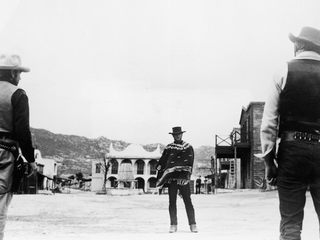 Cartoonist Mark Knight imagined a classic spaghetti western showdown to capture the Liberals’ party room vote for a new leader, casting the politicians as cowboys. American actor Clint Eastwood is seen staying cool in 1964’s A Fistful of Dollars, directed by Sergio Leone. Picture: United Artists/Courtesy of Getty Images