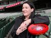 Born into footy: Kane’s first MCG taste at 20 minutes old