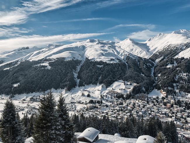 This is the famous town Davos in Switzerland in winter. The image was taken on the first platform at cable car Jakobshorn Davos itself is known as a holiday destination and above all the annual World Economic Forum (WEF) takes place here.