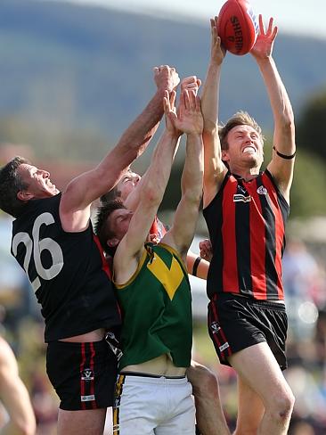 Gippsland Football League Grand Final match between Maffra Eagles and Leongatha Parrots. Maffra became the 2016 premiers, defeating Leongatha 13.10 (88) to 9. 16 (67). Trent Knobel and Sam Pleming represent Maffra in a marking contest against Christopher Verboon. Picture: Yuri Kouzmin