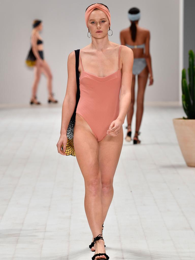 A model walks the runway in a design by Fella during the Swim show at Mercedes-Benz Fashion Week Resort 19 Collections at Carriageworks on May 14, 2018 in Sydney, Australia. (Photo by Stefan Gosatti/Getty Images)