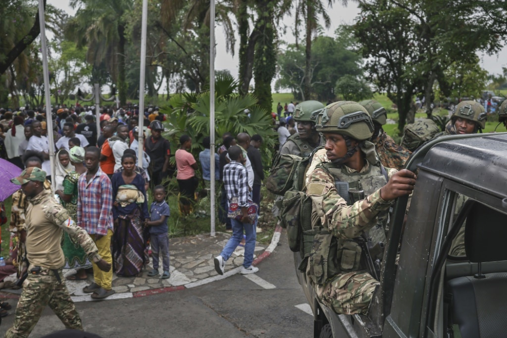 Volunteers line up to fight M23 fighters alongside Congolese forces at a stadium in Bukavu