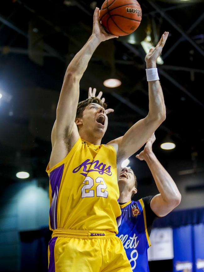 Dane Pineau accepted the defensive player of the year award for Andrew Bogut.