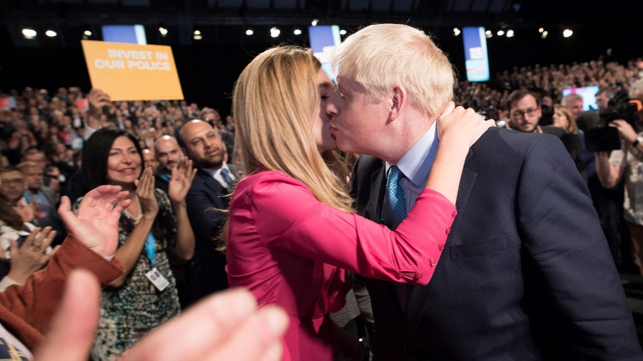 The couple shared a kiss at the end of the speech. Picture: Stefan Rousseau/AFP