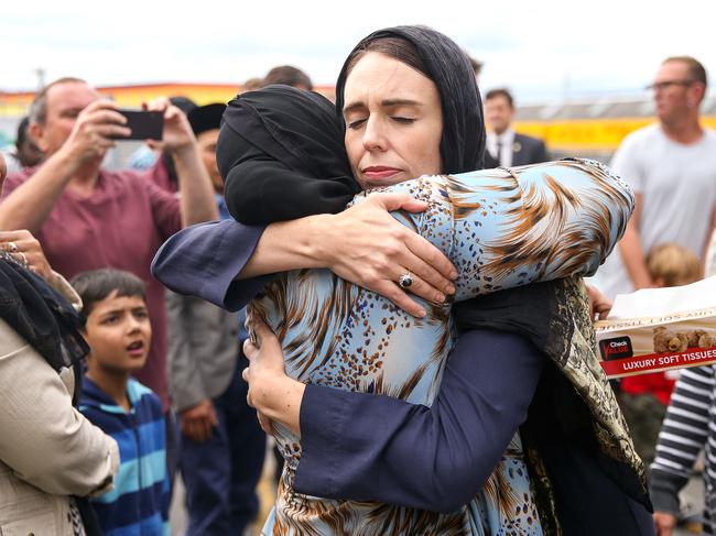 WELLINGTON, NEW ZEALAND - MARCH 17: Prime Minister Jacinda Ardern hugs a mosque-goer at the Kilbirnie Mosque on March 17, 2019 in Wellington, New Zealand. 50 people are confirmed dead and 36 are injured still in hospital following shooting attacks on two mosques in Christchurch on Friday, 15 March. The attack is the worst mass shooting in New Zealand's history. (Photo by Hagen Hopkins/Getty Images) ***BESTPIX***