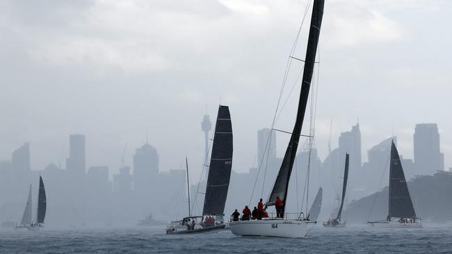 A torrential downpour hit competitors just before the 1pm start. Picture: Richard Dobson