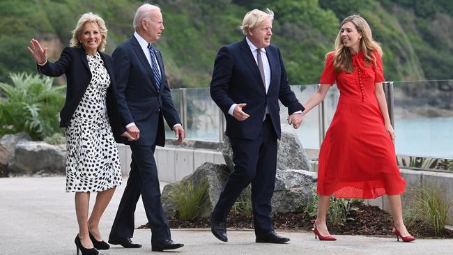 Jill and Joe Biden take a stroll in Carbis Bay with Boris and Carrie Johnson on Thursday. Picture: Getty Images