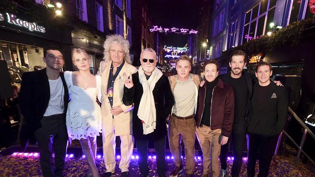 Rami Malek, Lucy Boynton, Brian May, Roger Taylor, Ben Hardy, Joe Mazzello, Gwilym Lee and Allen Leech attend the Carnaby Street Bohemian Rhapsody Light Installation in London this week. Picture: Getty