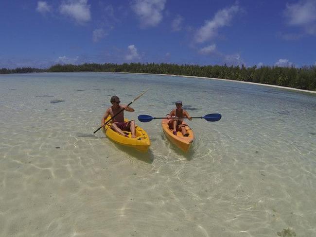 Steph Lineen and her partner paddling in the Cook Islands.