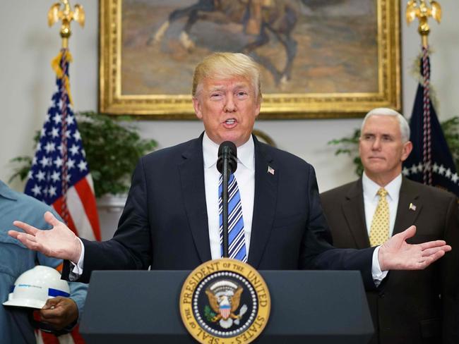 US President Donald Trump speaks before signing Section 232 proclamations on steel and aluminum imports in the Roosevelt Room of the White House on March  8, 2018 in Washington, DC. Trump on Thursday declared the American steel and aluminum industries had been 