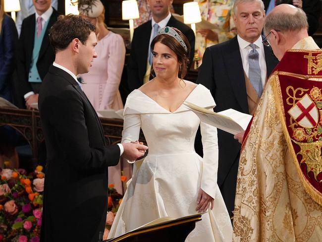 Dean of Windsor, David Conner (right) presides over the wedding ceremony of Britain's Princess Eugenie of York and Jack Brooksbank at St George's Chapel, Windsor Castle. Picture: AFP