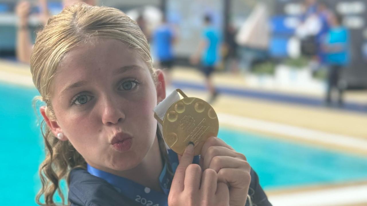 Maggie Grey with her world junior gold medal.