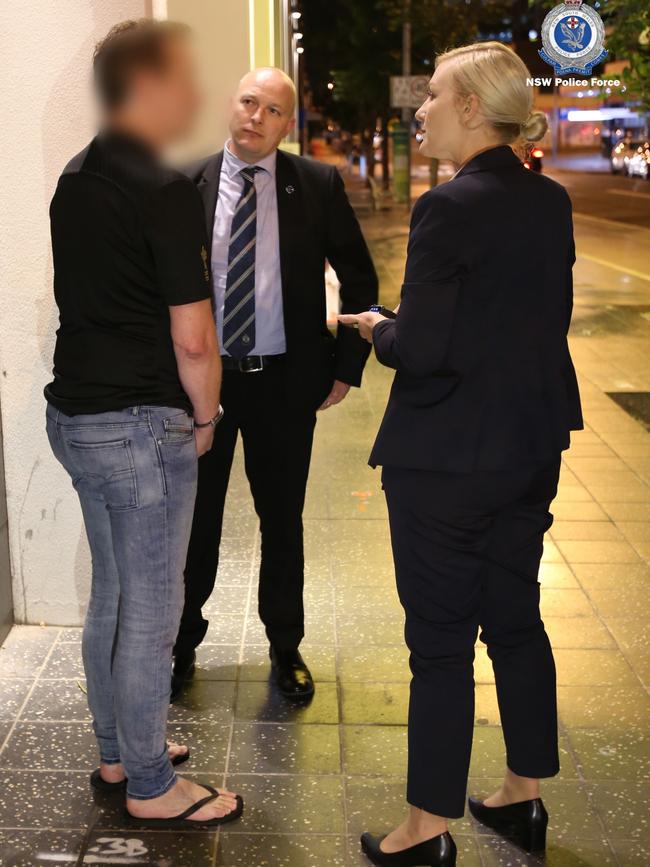 Detectives speak to the man. Picture: NSW Police Force