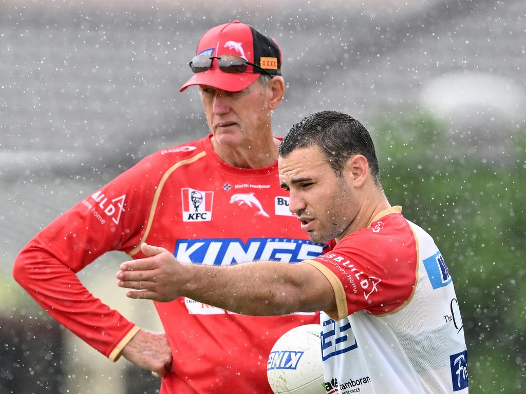 (L-R) Wayne Bennett talks tactics with Dolphins halfback Sean O'Sullivan. Picture: Bradley Kanaris/Getty Images