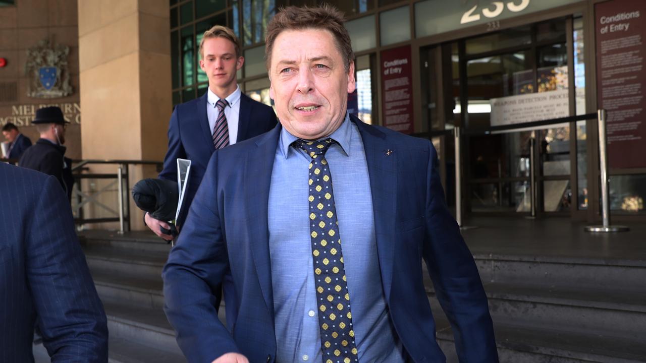 Former Essendon premiership captain and ex-AFL coach Mark Thompson leaves the Melbourne Magistrate Court.