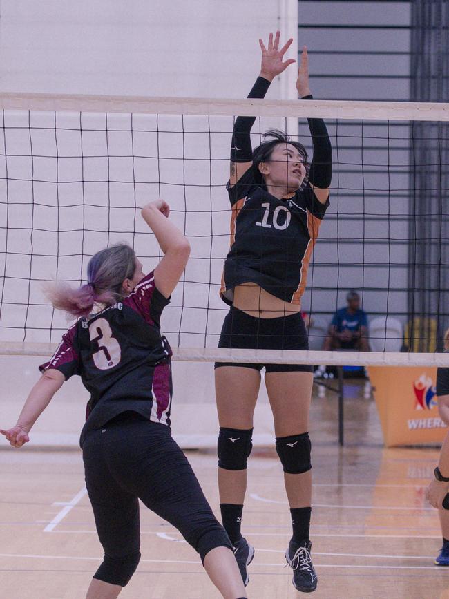 Action as Hard CorÃ“t V Haikyu in the Pan Pacific Masters Games Volleyball tournament. Picture: Glenn Campbell