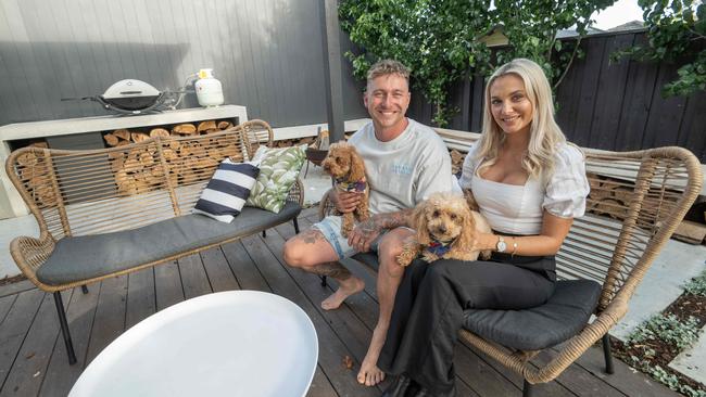 Aidan and Jean Hall, pictured with their dogs, Rio and Pumpkin and are selling their home in Doreen. Picture: Tony Gough.