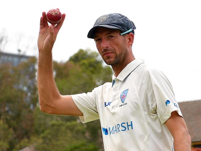 Trent Copeland of the Blues shows the ball at the change of innings after taking five wickets in the innings and bringing up his 300 first class wickets, on day three of the Marsh Sheffield Shield match between the NSW Blues and South Australia Redbacks at Bankstown Oval in Sydney, Wednesday, February 26, 2020. (AAP Image/Dan Himbrechts) NO ARCHIVING, EDITORIAL USE ONLY, IMAGES TO BE USED FOR NEWS REPORTING PURPOSES ONLY, NO COMMERCIAL USE WHATSOEVER, NO USE IN BOOKS WITHOUT PRIOR WRITTEN CONSENT FROM AAP