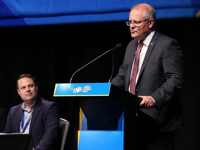 Lord Mayor Adrian Schrinner listens to Prime Minister Scott Morrison’s speech to the LNP state convention yesterday. Picture: Jono Searle/AAP