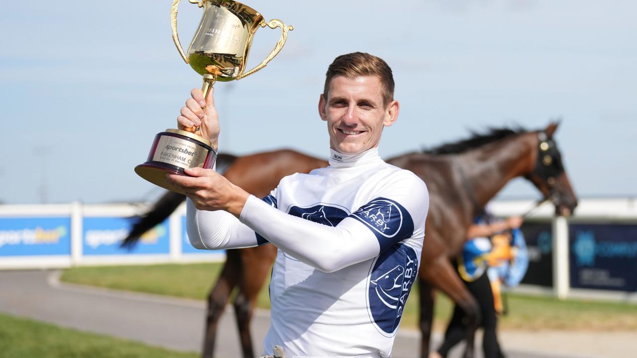 Beau Mertens hold the Pakenham Cup aloft. Picture: Scott Barbour/Racing Photos via Getty Images