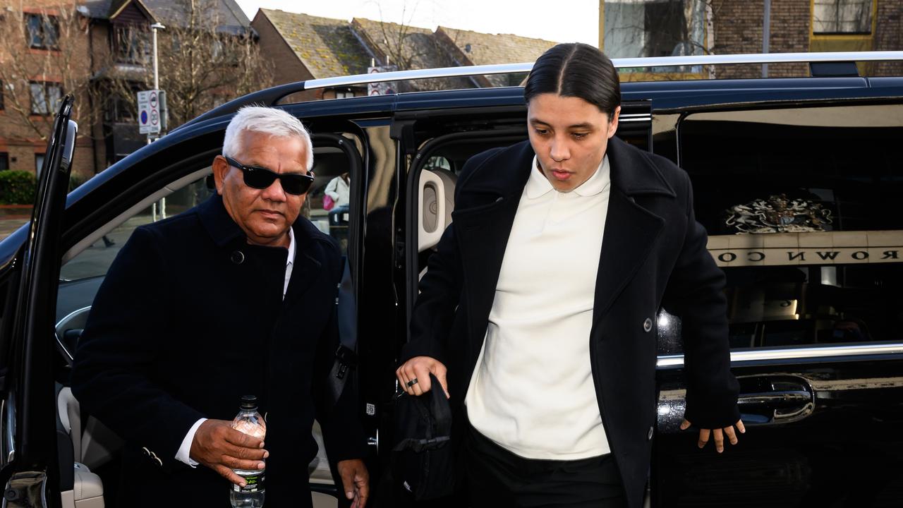 Sam Kerr (right) arrives at Kingston-Upon-Thames Crown Court with her father Roger Kerr. (Photo by Leon Neal/Getty Images)