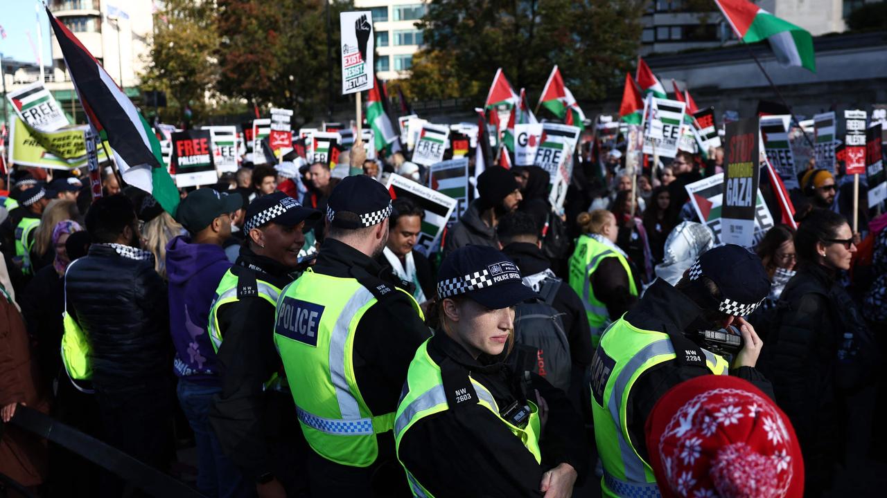 Police monitoring the pro-Palestinian march. Picture: Henry Nicholls/AFP