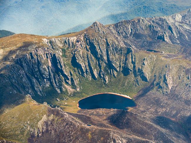 2019 Tasmanian bush fires. Lake Rhona and Denison Range, Gell River Fire - at Southwest National Park. . Picture - LUKE TSCHARKE / PAR AVION