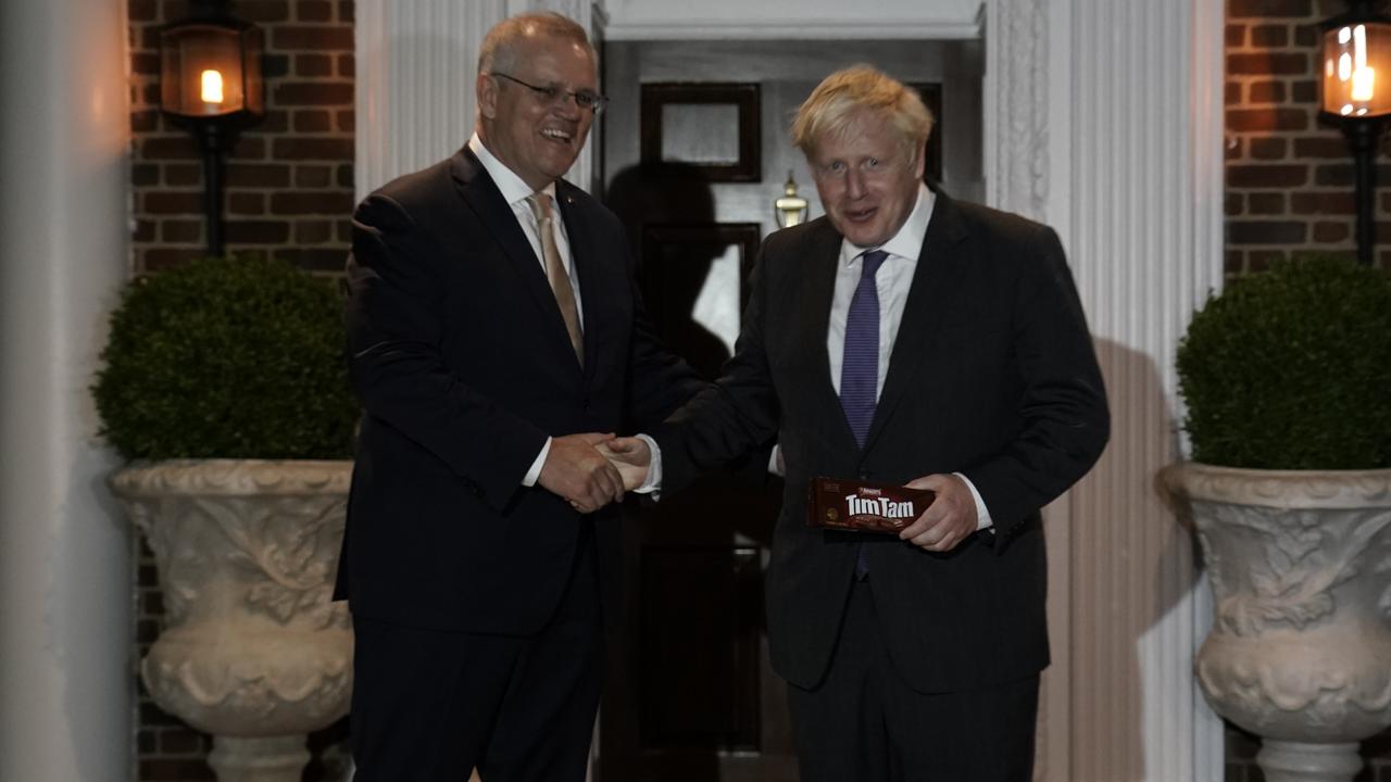 Prime Minister Scott Morrison greets UK Prime Minister Boris Johnson in Washington. Picture: Adam Taylor