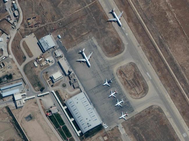 This handout satellite image released by Maxar Technologies shows satellite imagery of the Mazar-i-Sharif and grounded planes at the airport in northern Afghanistan. Picture: AFP