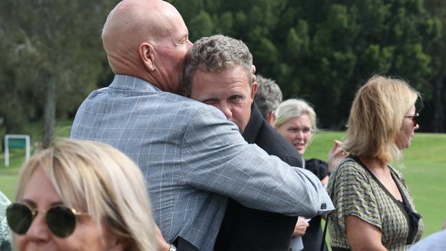 Daphne’s son Robert Pirie, supported by friends after the service. Picture Glenn Hampson