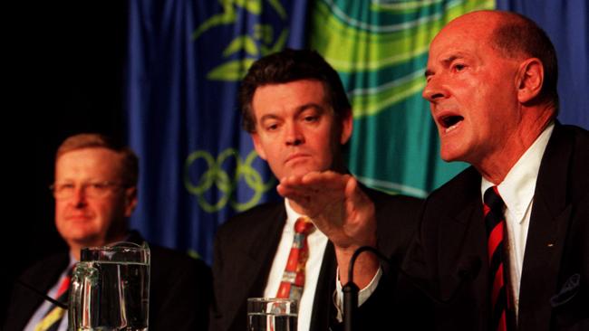 Coates (left) with Michael Knight and Kevan Gosper ahead of the Sydney Olympics. Photo: Brett Faulkner.