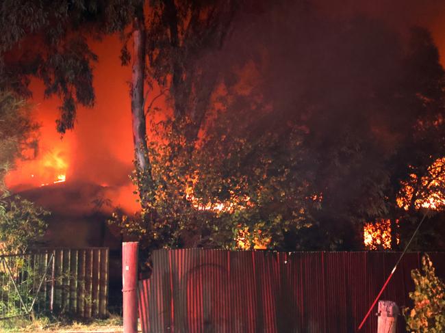 A Cardross house has gone up in flames after fire tore through it on Saturday night. Picture: Glenn Milne