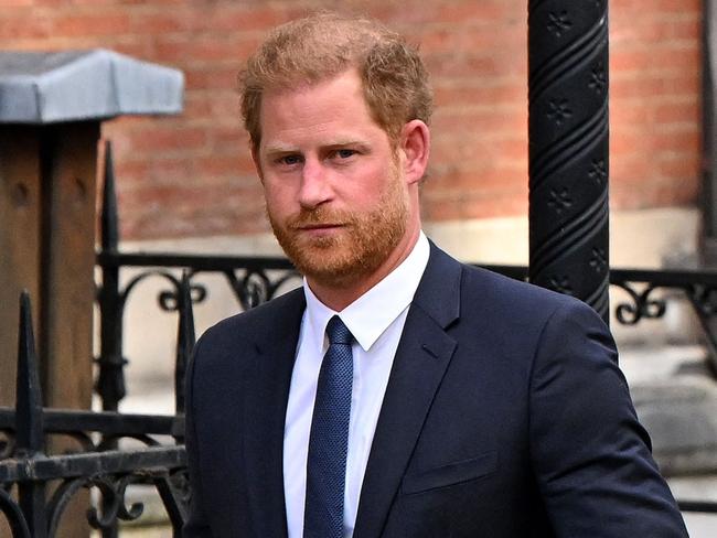 (FILES) Britain's Prince Harry, Duke of Sussex leaves from the Royal Courts of Justice, Britain's High Court, in central London on March 27, 2023. Lawyers for Prince Harry on December 5 began a legal challenge over his security arrangements in the UK, after he quit frontline royal duties and moved to North America.  The case about his loss of UK taxpayer-funded protection is the latest in a string of court proceedings initiated by Harry, whose father is King Charles III. (Photo by JUSTIN TALLIS / AFP)