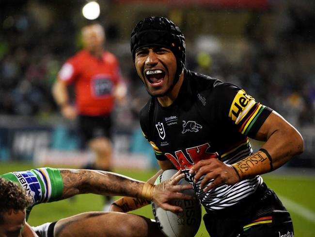 Stephen Crichton celebrates scoring a try.