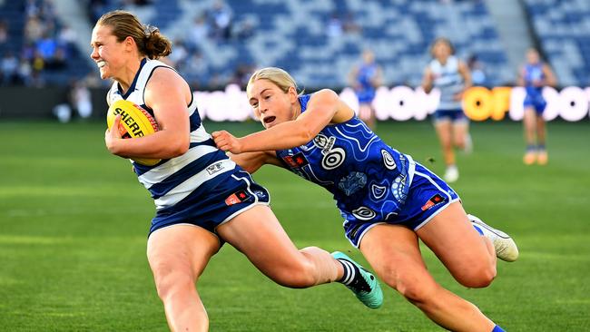 Jasmine Ferguson tackles Geelong’s Chloe Scheer. Picture: Josh Chadwick/AFL Photos