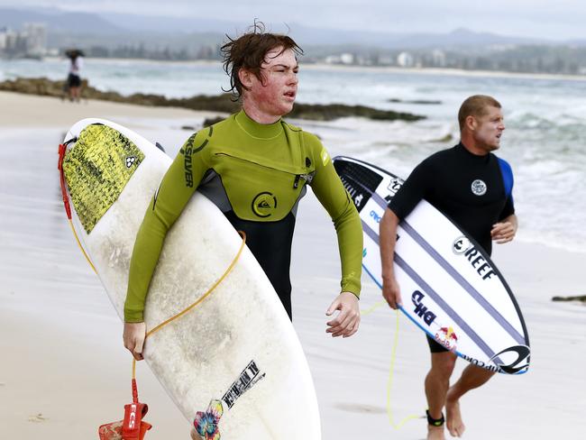Starlight ambassador, Mick Fanning making a Starlight Wish come true to surprising 16-year-old Adelaide teen, Ben Beasley, 16, and taking him out for a surf at Snapper Rocks. Picture: Jerad Williams