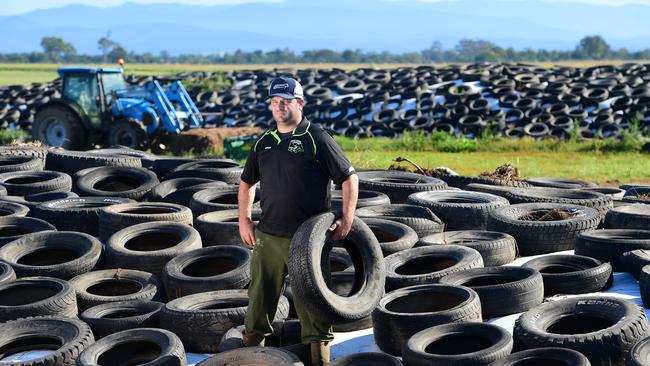 Bad timing: Adrian Whittaker, on his dairy farm at Denison, is not sure what his family is going to do with all the tyres holding down their feed. Picture: Zoe Phillips