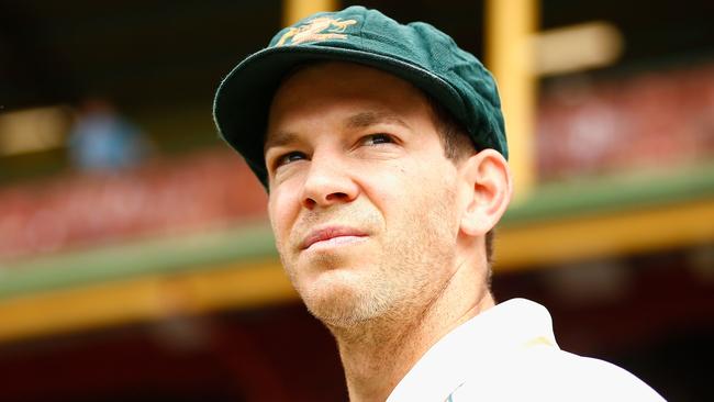 Australia's wicketkeeper and captain Tim Paine holds to hope he will lead his side into battle in his home state (Photo by JEREMY NG / AFP)