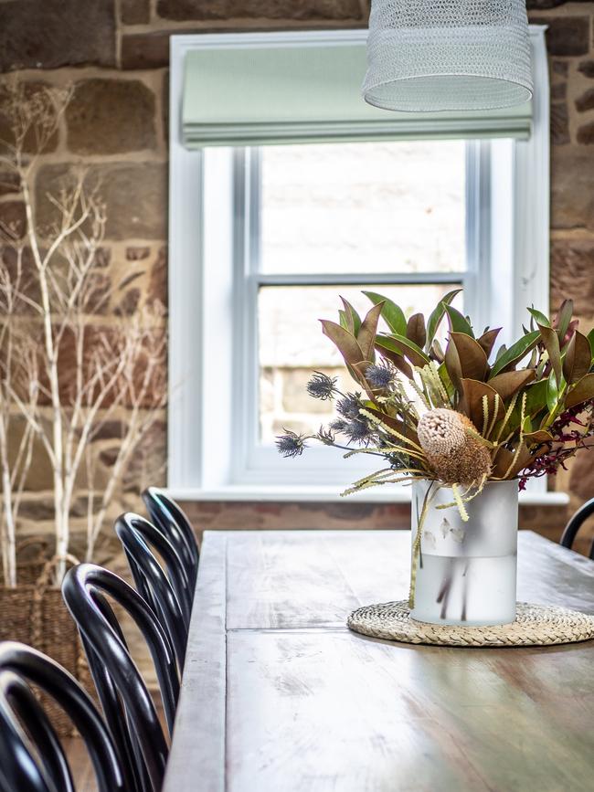 A range of fresh and dried flower arrangements at Raffah House add to the inviting atmosphere of the guest home.