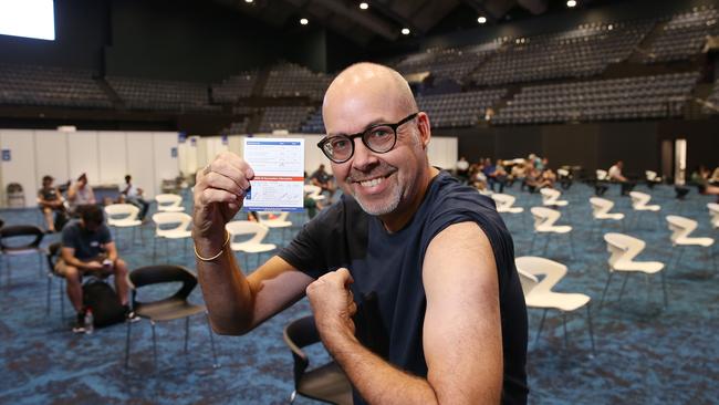 Tourism worker Marcus Brady was vaccinated against the Covid-19 coronavirus at the mass vaccination hub set up in the Cairns Convention Centre. Picture: Brendan Radke