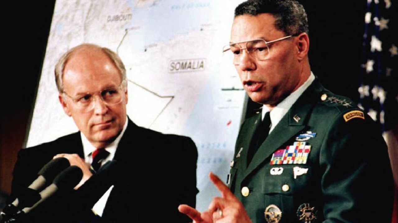 Then US Secretary of Defence Dick Cheney (L) and then Chairman of the Joint Chiefs of Staff Gen. Colin Powell (R)