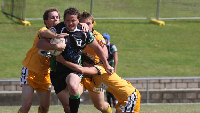 Maroochydore’s Ricky Duncan charges ahead carrying a few Caloundra defenders. Picture: Nicholas Falconer