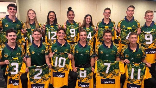 Kirralee Costelloe (back row, third from left) receives her Australian touch jersey alongside fellow Central Queensland players.