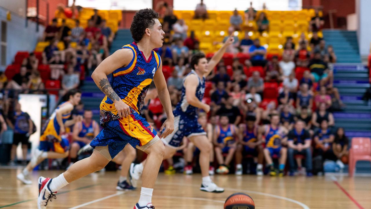 William Burton dribbles the ball. Darwin Basketball Men's Championship Round 20: Ansett v Tracy Village Jets. Picture: Che Chorley