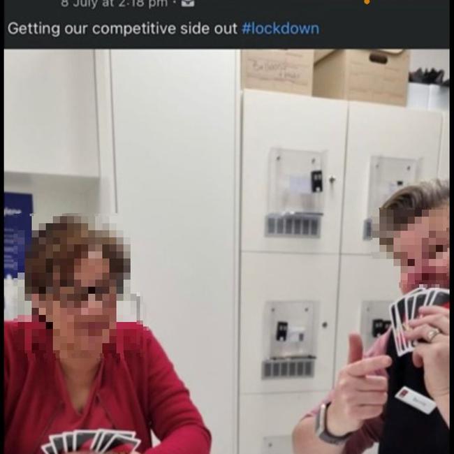 Unmasked employees playing Uno at an undisclosed branch.