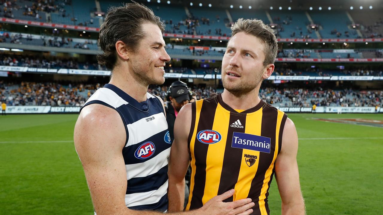 Isaac Smith and ex-teammate Liam Shiels after the match. Picture: AFL Photos/Getty Images