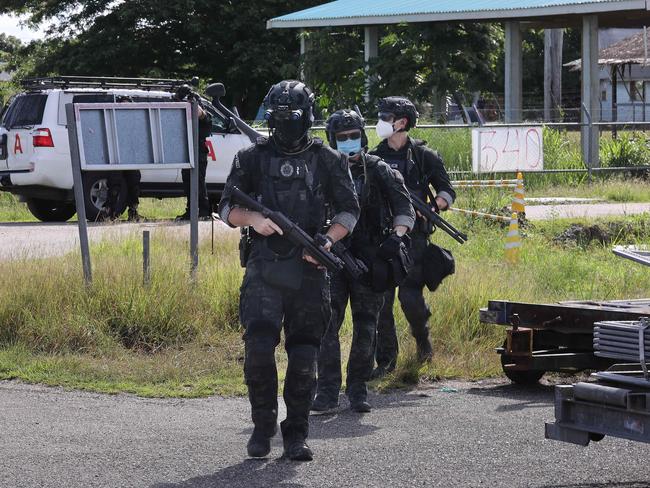 Australian military personnel in downtown Honiara. Picture: Gary Ramage