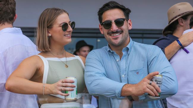 Having a ball at The Great Northern Darwin Cup at Fannie Bay Turf Club are George Douvartzidis and Chloe Jamieson. Picture: Glenn Campbell