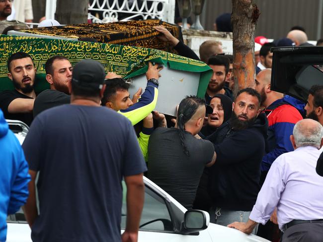 Mourner carrying the coffin of Assaad at his funeral on Friday. John Feder/The Australian.